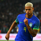 Brazil’s forward Richarlison celebrates after scoring his team’s second goal during the friendly football match between Brazil and Tunisia at the Parc des Princes in Paris on September 27, 2022
